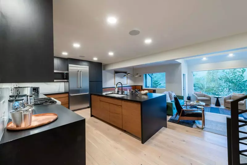 The high end kitchen features new full size Thermador appliances, gas range as well as small appliances like a blender, toaster and coffee make