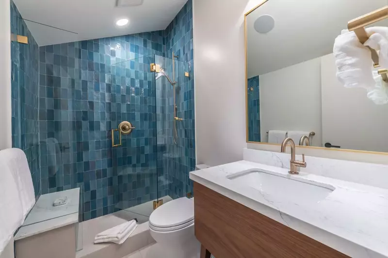 All new Bathrooms with White Granite Sinks