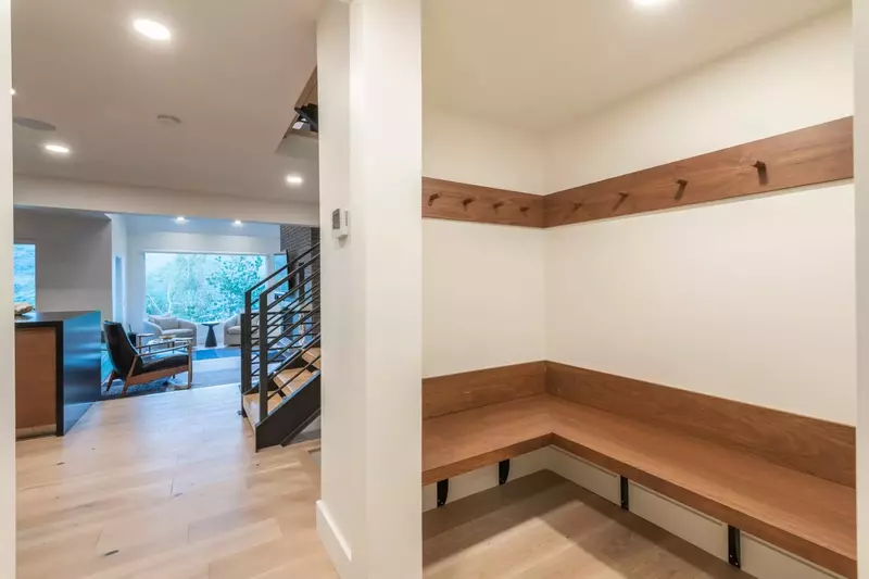 Spacious Coat Hangers and Bag Storage Area