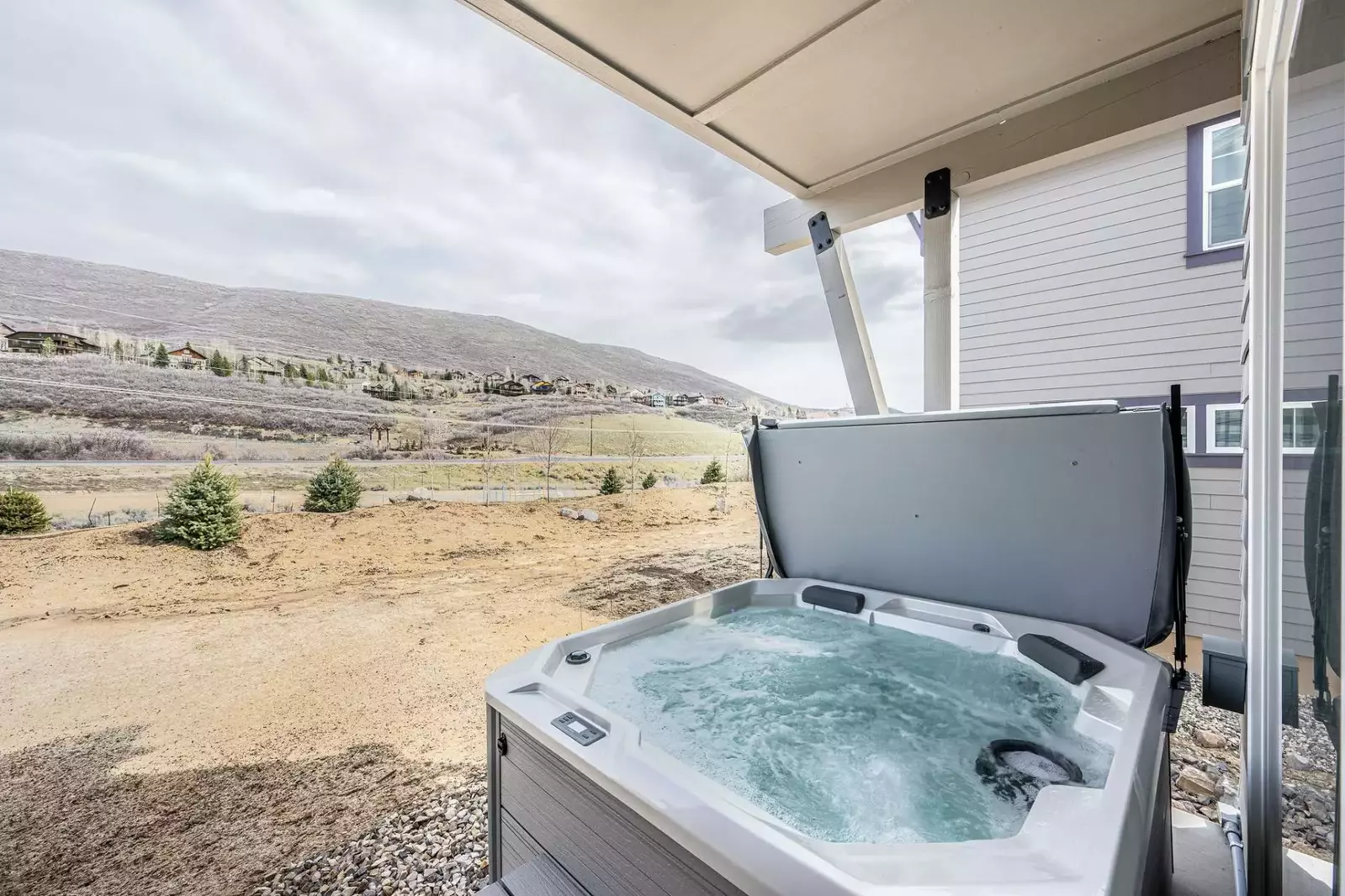 Brand new 6 person private hot tub on your back porch with views of the mountains