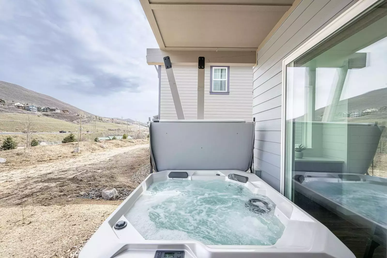 Located just off the back patio guests will be able to relax in their own private hot tub under the stars