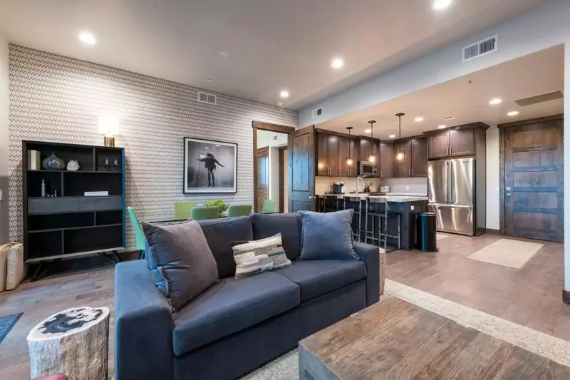 Professionally Designed & Furnished,Our Family Room is equipped with an Comfortable Sofa, Gas Fireplace, Smart TV, Hardwood Flooring, Comfortable Chai