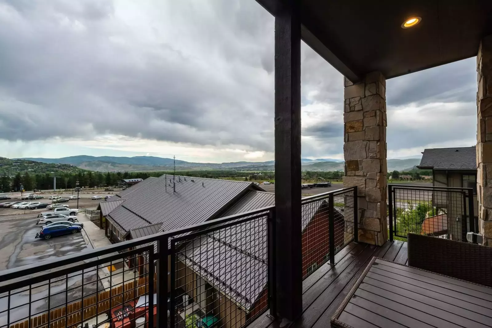 Private patio with gas grill and dining furniture