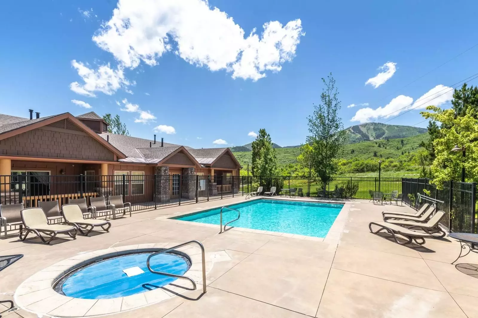 The community hot tub is open all year and it is just steps away from the home.