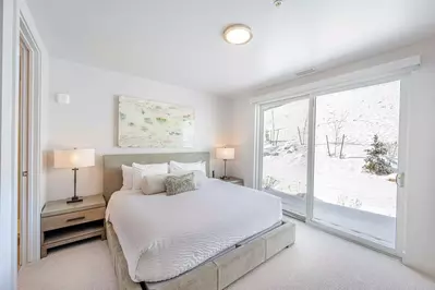 The first guest suite is located next to the entry and features a King size bed with high quality linens, smart HDTV and a spacious dresser for storag