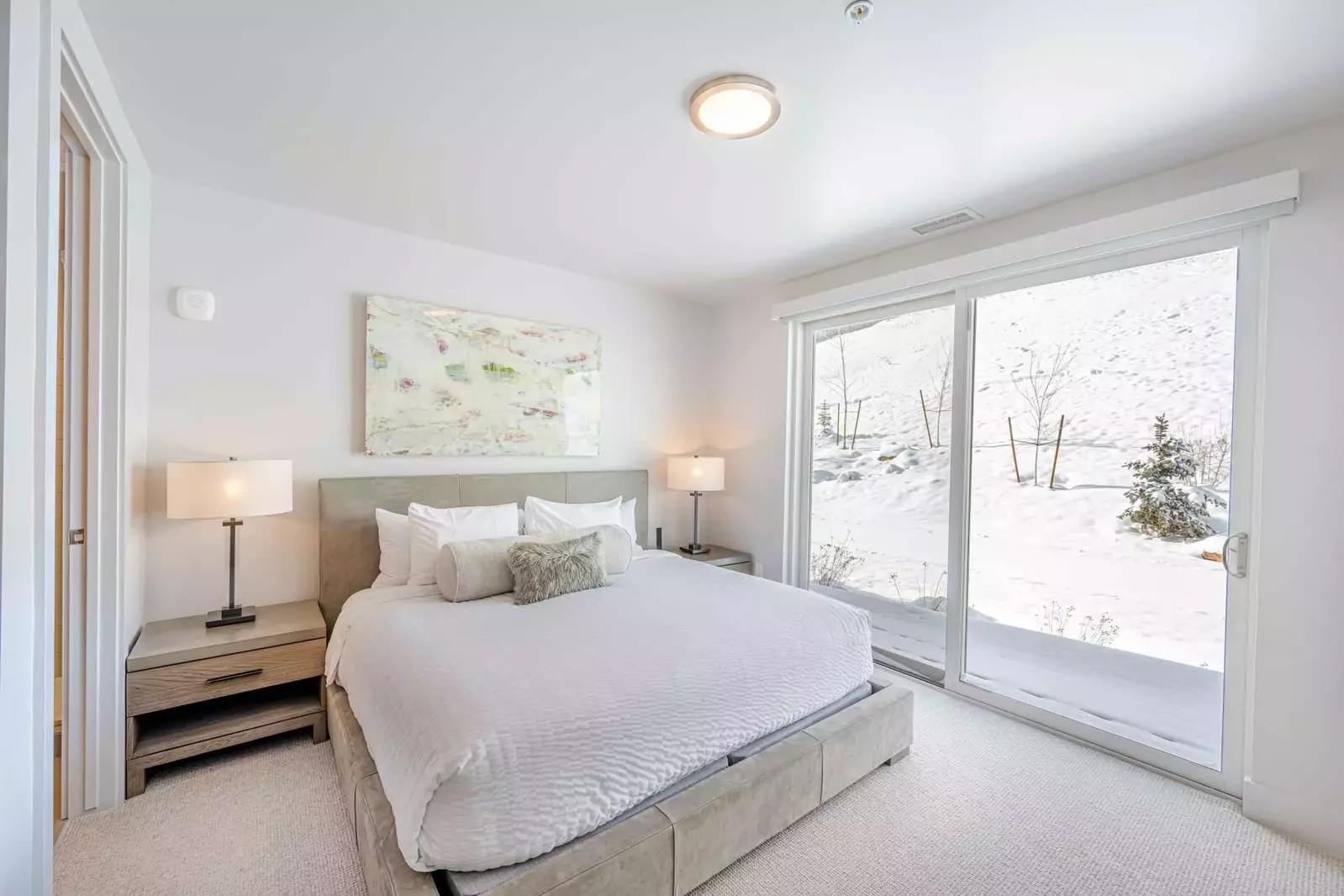 The first guest suite is located next to the entry and features a King size bed with high quality linens, smart HDTV and a spacious dresser for storag