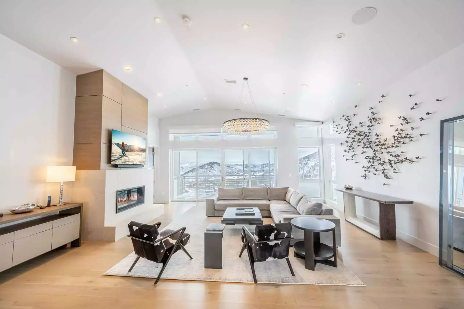 The Elegant, High End Penthouse Has Gorgeous Views from the Living Room, Oversized L-Shaped Sofa, Gas Fireplace, Smart HDTV, Cable