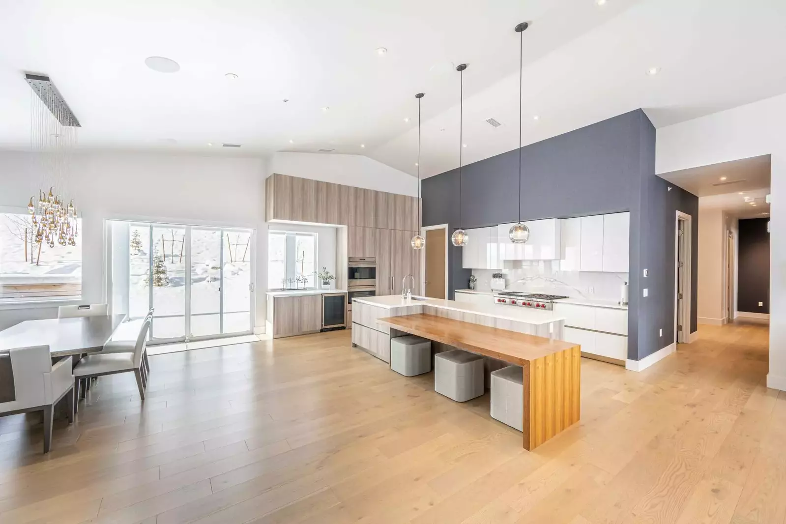 The thoughtful, open concept floor plan brings the beauty of the natural surroundings while blending modern architecture