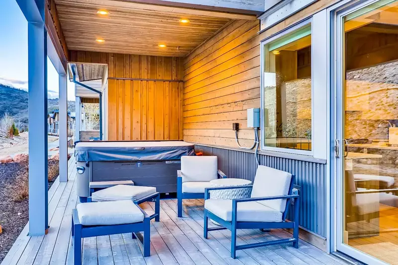 Nestled into the mountainside, the back deck is a great spot for taking in the sweeping views, you can relax in your private Hot Tub or enjoy your fav