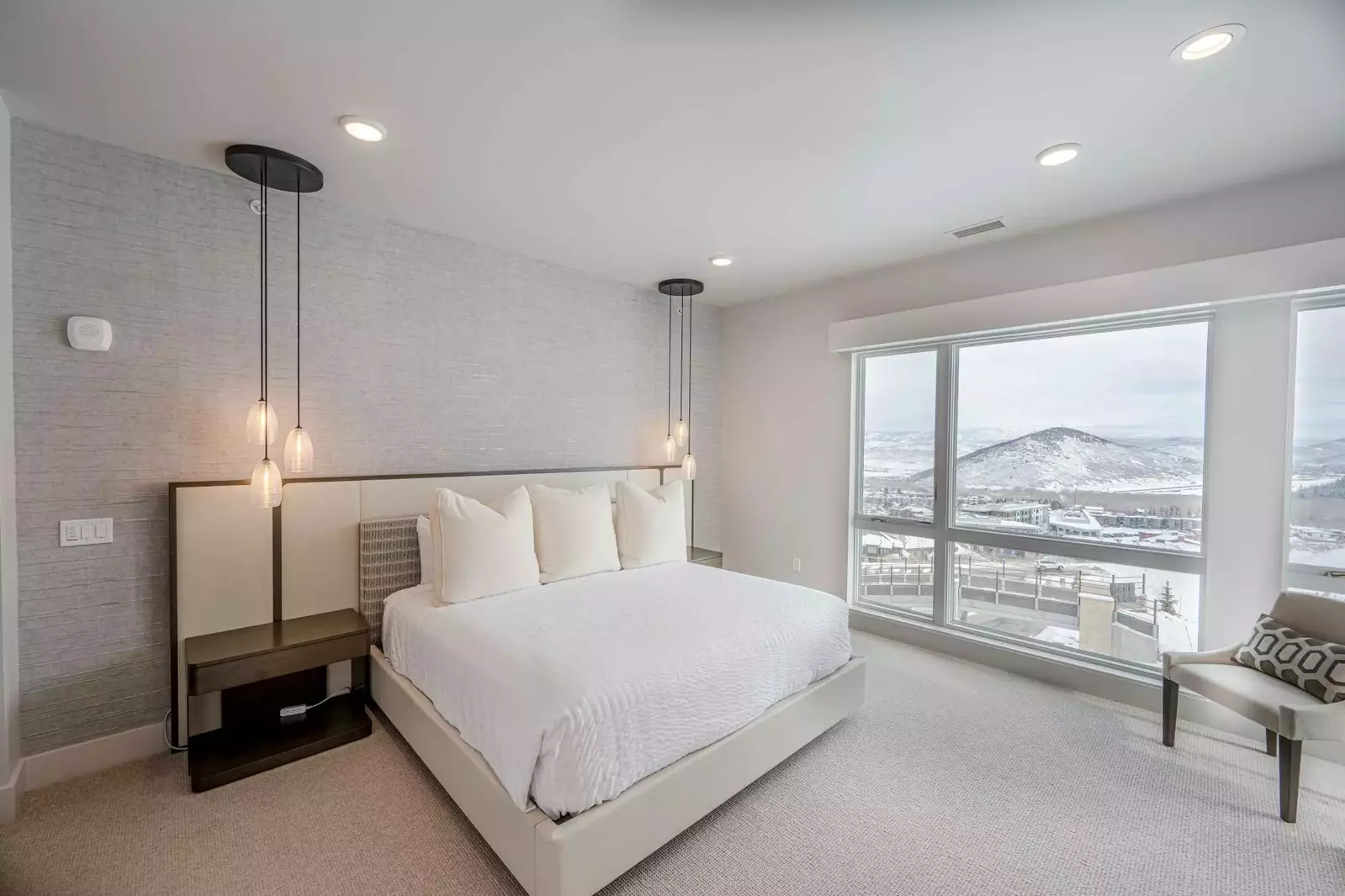 Sleek and elegant primary suite with king size bed