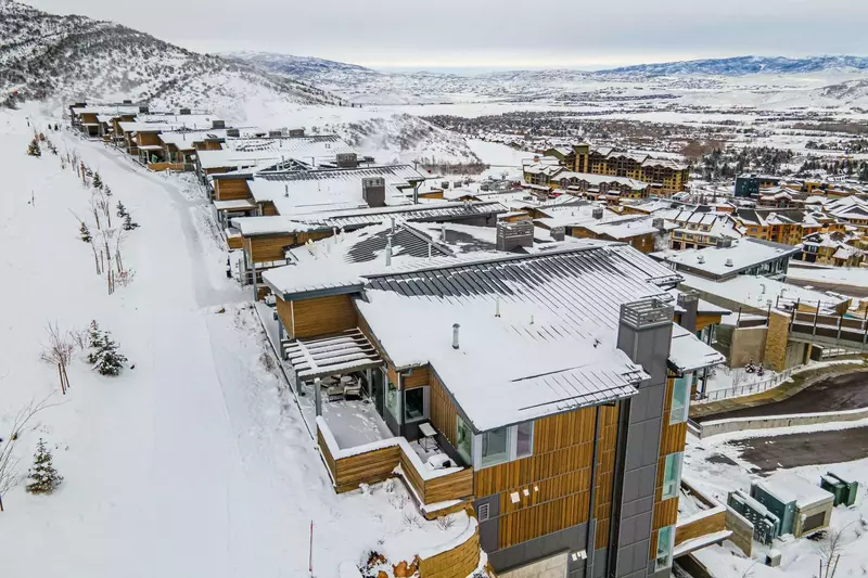 Our mountain modern home showcases astonishing views that overlook Snyderville Basin and beyond all the way to the Uinta Mountains
