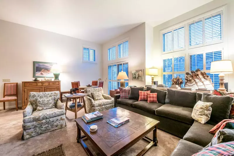The family room is also filled with lots of natural light because of the classic Park City floor to ceiling windows surrounding the space.