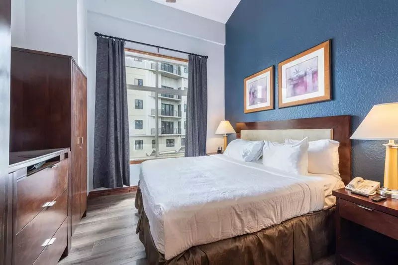 Spacious bedroom with King Bed, HDTV, Black Out Curtains, Pocket Doors