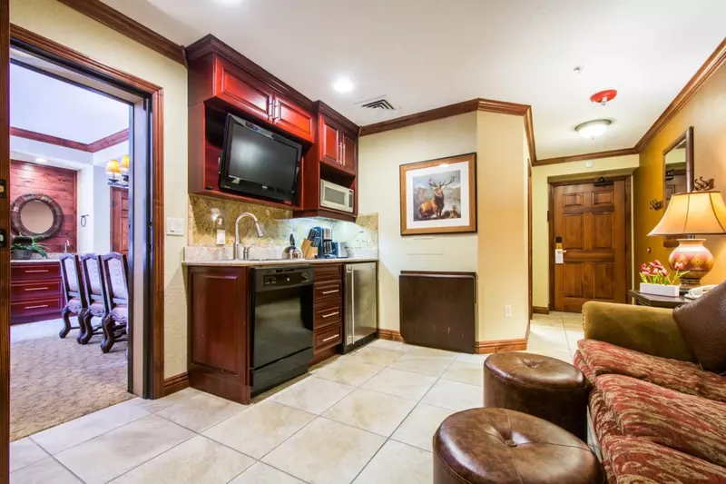 Living suite (2) with gourmet kitchenette, comfortable living area with HDTV and large bedroom suite.