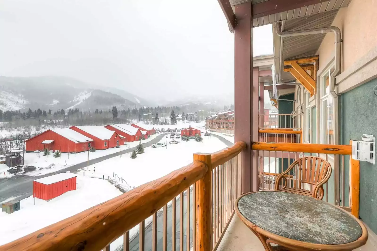 Private penthouse balcony with mountainous views.