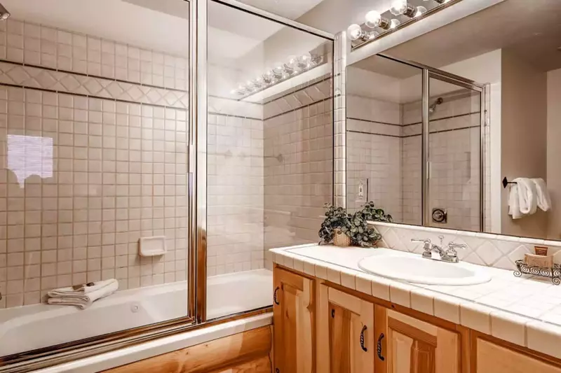 Master En Suite Bathroom with Oversized Jetted Tub, Tiled Glass Shower, Large Vanity