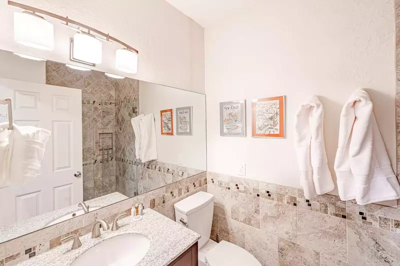 Recently remodeled second full size bathroom. Features a full size shower.
