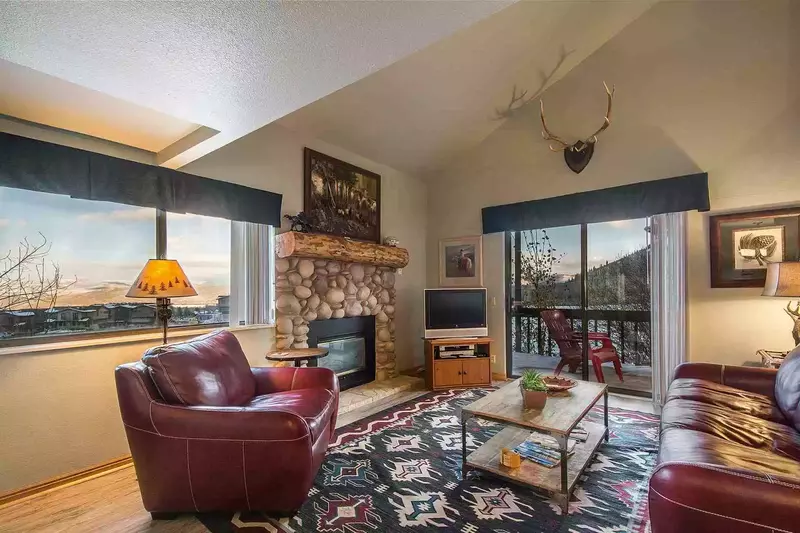 Welcome to Red Pine Winter Way! It features a spacious great room with a river rock decor fireplace, flatscreen TV and comfortable new furnishings.