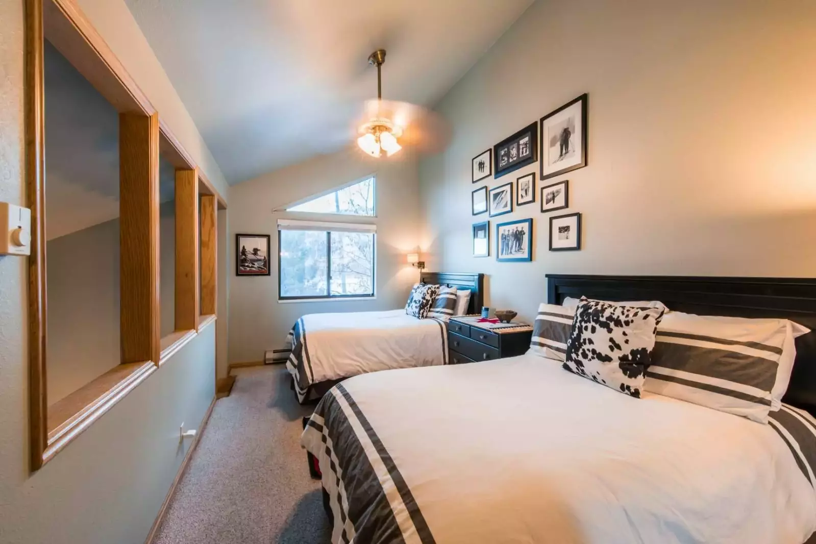 Second floor loft bedroom with two beds