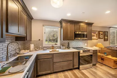 Newly Renovated Summer 2020!! The bright and spacious was recently updated kitchen has all new hardwood flooring throughout, new hardwood cabi