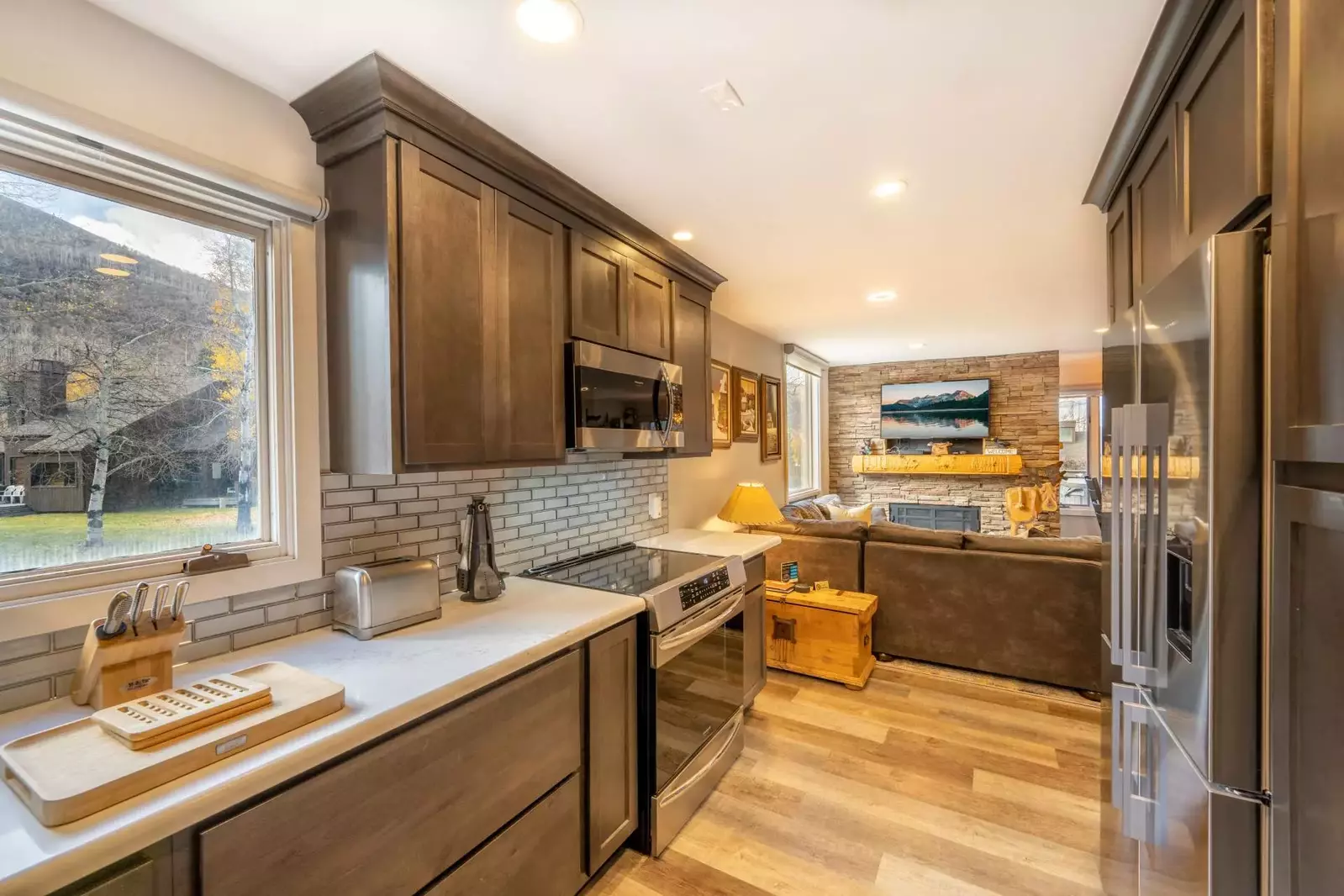 Our newly remodeled kitchen features all new stainless steel appliances including a new stainless french door fridge, new hardwood flooring, backsplas