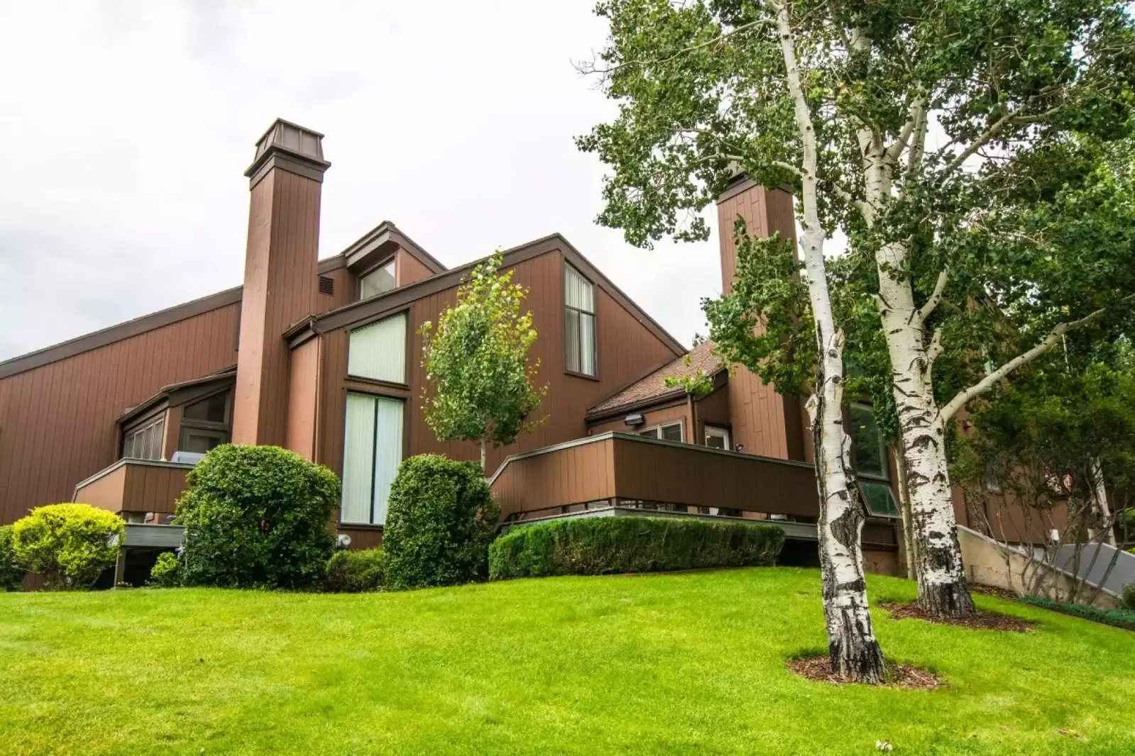 Our Home is on the left hand side of this photo. The private deck overlooks the golf course and has a Private Hot Tub & BBQ Grill