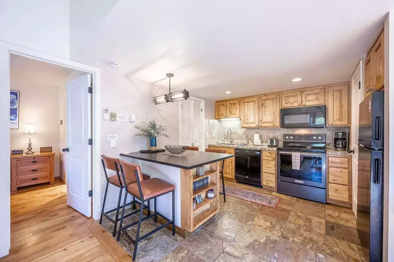 Gorgeously updated 3 bedroom / 2 bathroom home at Red Pine in Canyons. The updated kitchen offers a brand new breakfast bar with 4 comfortable bar sto