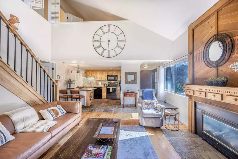 The condo is bright, spacious and fully furnished with a large sofa, a gas burning fireplace, new hardwood flooring, and a HDTV complete with Comcast