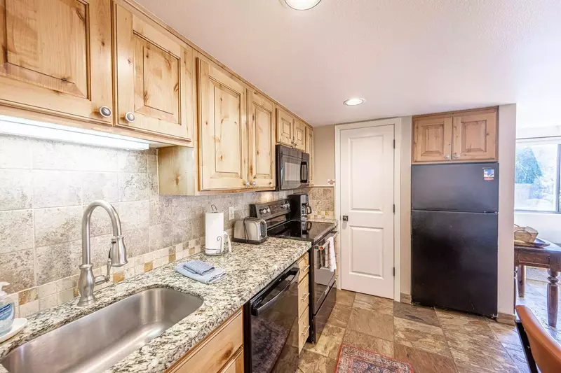 Newly Updated kitchen is also fully equipped with a fridge, dishwasher, stove / oven, microwave and a complete array of other small household applianc