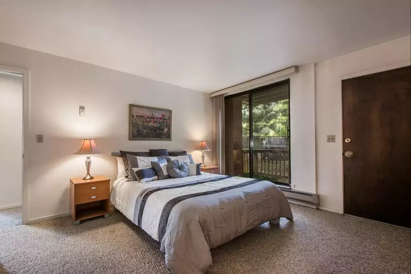 The master bedroom not only has tons to storage space with the closet, dresser and nightstands, but also has access to your walk-out balcony.