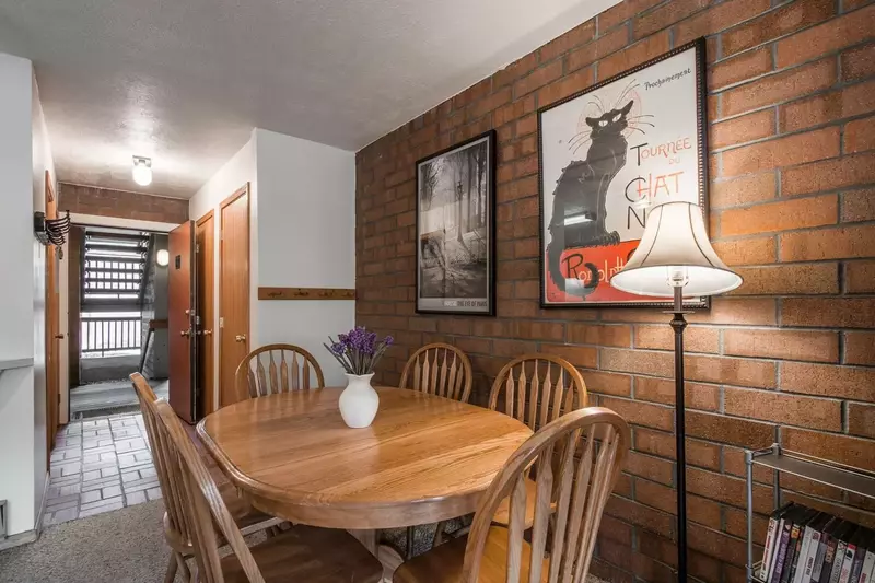 The dining room is located just off of the kitchen and can accommodate six (6) people.