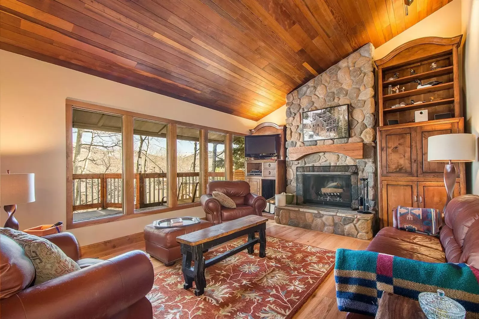Private Deck, Natural lighting and panoramic views invite family and friends to gather in the living area.