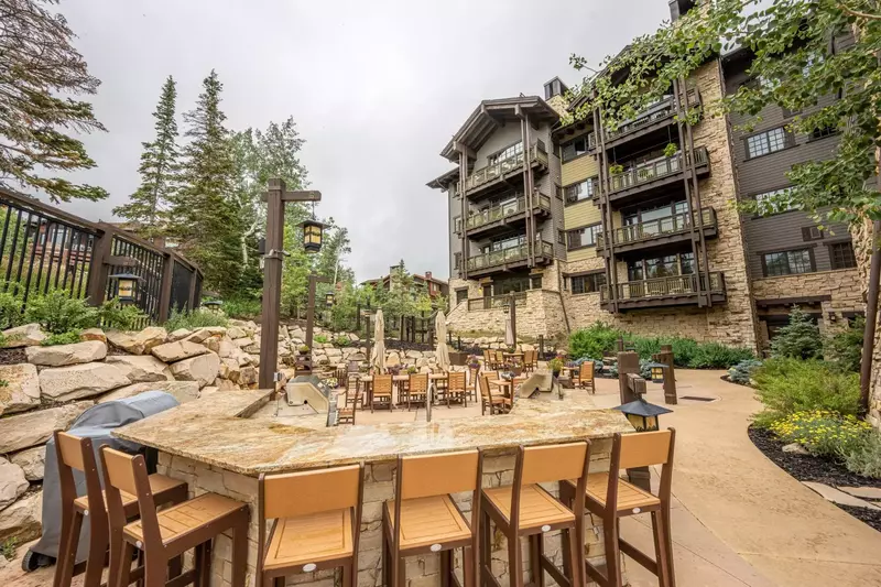 Resort-Like Amenities Including a Large Courtyard with Hot Tubs, Waterfall, Fire Pit, Gas Grill and Comfortable Seating