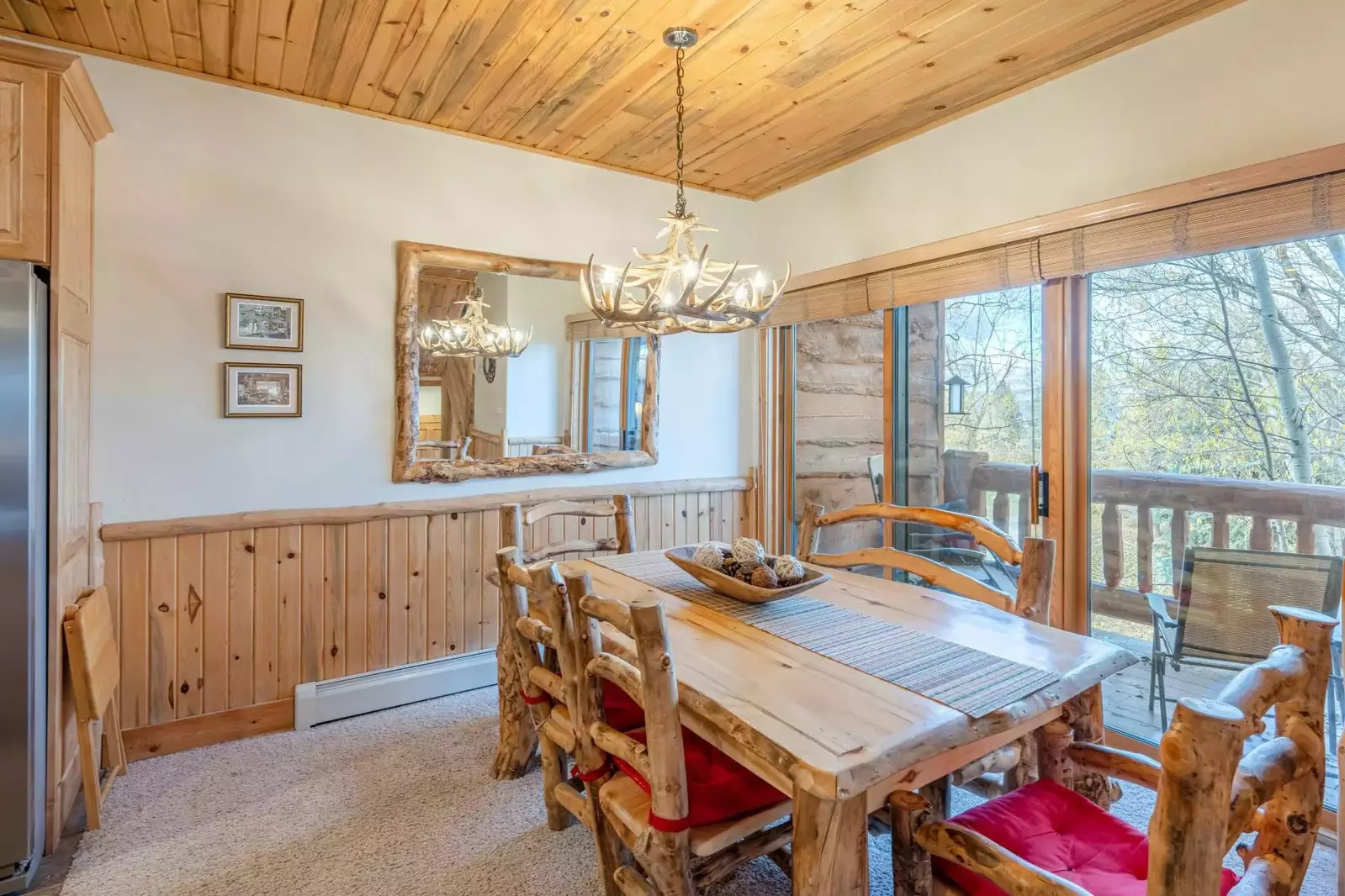 Our comfortable dining room offers plenty of seating and gorgeous mountain views. There is seating for 6-7 at the table and additional seating at the