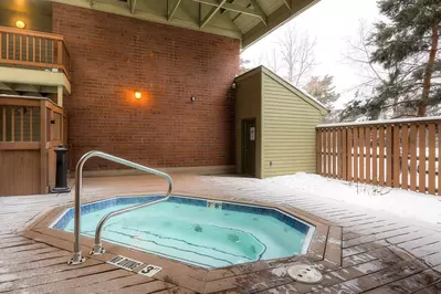The communal hot tub is outdoors - making it beautiful year round- but it is also conveniently covered.