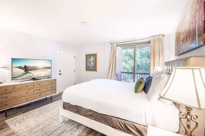 The gorgeous hardwood floors continue into the Primary Suite, adding natural warmth to the entire space. The Primary Suite has been beautifully update