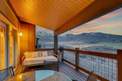 Located Just off The Kitchen / Dining Room is the Upper Deck. Rewind & Relax while you watch the wildlife from the outdoor sofa