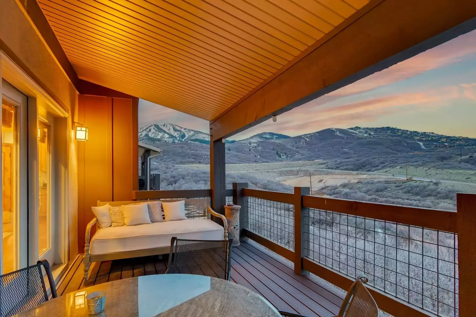 Located Just off The Kitchen / Dining Room is the Upper Deck. Rewind & Relax while you watch the wildlife from the outdoor sofa