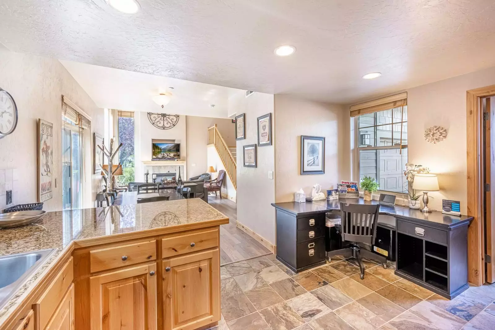 The Home Has Plenty of Room for Everyone To Work & Play! This is The View From Kitchen - Laundry Room to the Right, Office Area to the Left of the Lau