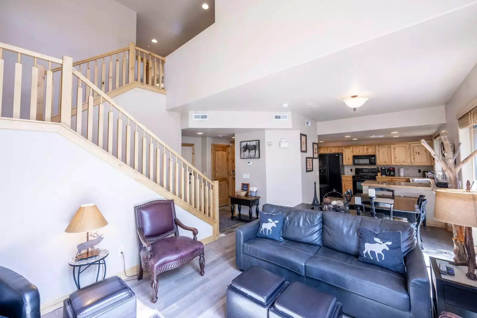 Gorgeously Updated with Wood Flooring, Designer Furnishings, Large Windows Allow Lots of Natural Light and Blinds are Provided When Privacy is Desired