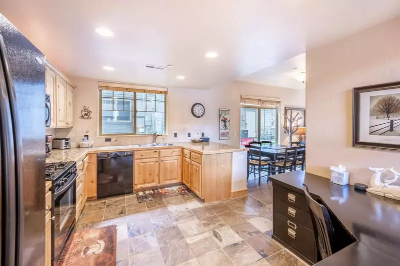 The Fully Stocked Large Kitchen is Perfect for Making Your Home Cooked Favorites - Or Enjoying Take Out From One of The Fabulous Dining Options Nearby