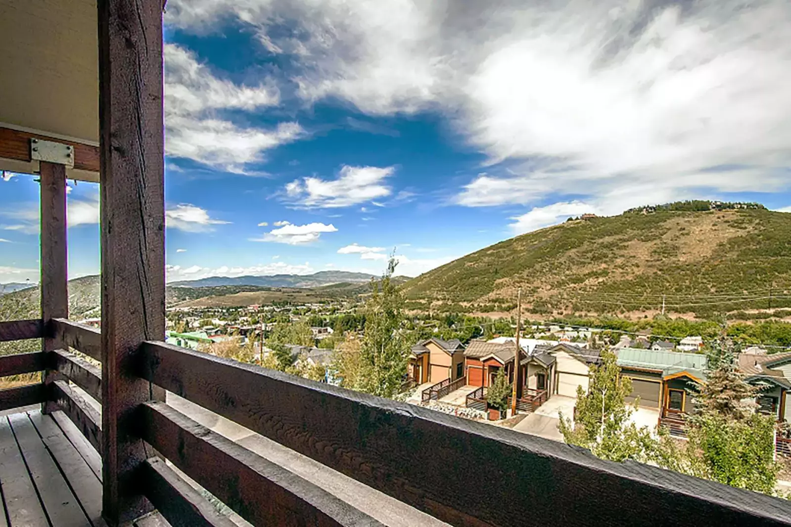 From the living room, you can easily access the large east-facing balcony that offers views of downtown Park City and endless vistas of the mountains.