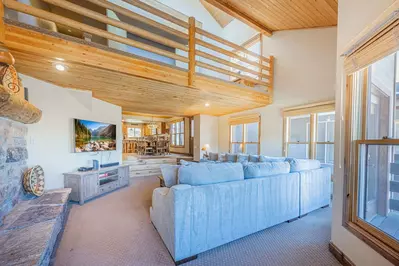 The large living room is the perfect place to watch the big game or cozy up with a good book. With Large Sofas, Gas Fireplace, HDTV there is something