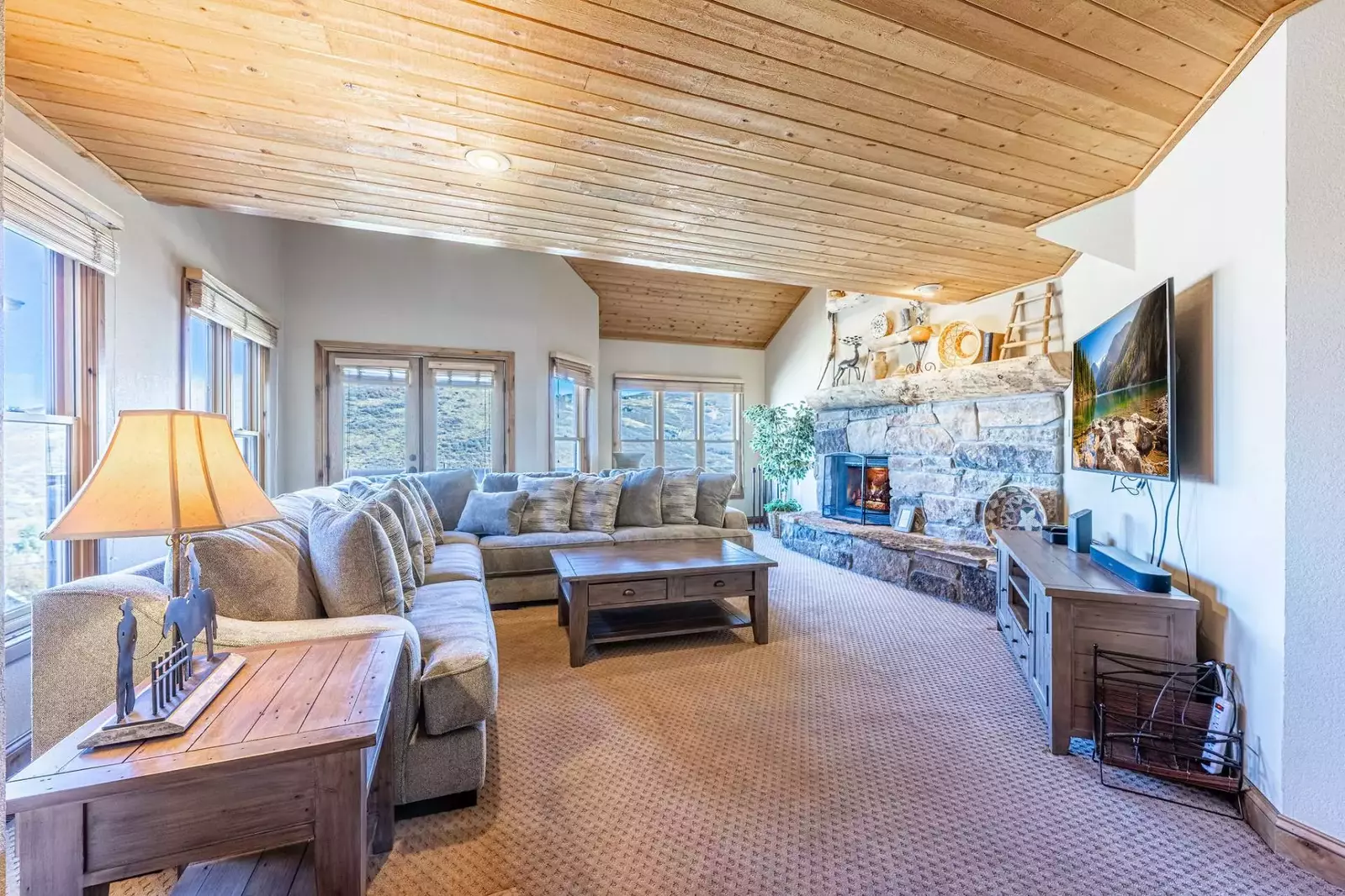 This living room is the perfect Place to Cozy Up – Gas Fireplace, New Oversized Couches, 42” HDTV with DVD player, Comcast and Philips speaker system.