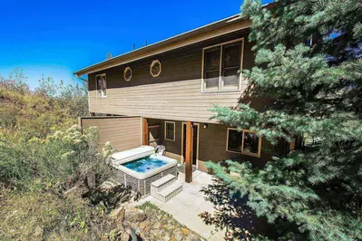 The walkout second floor offers access to your private Jacuzzi hot tub with seating for six (6) people.