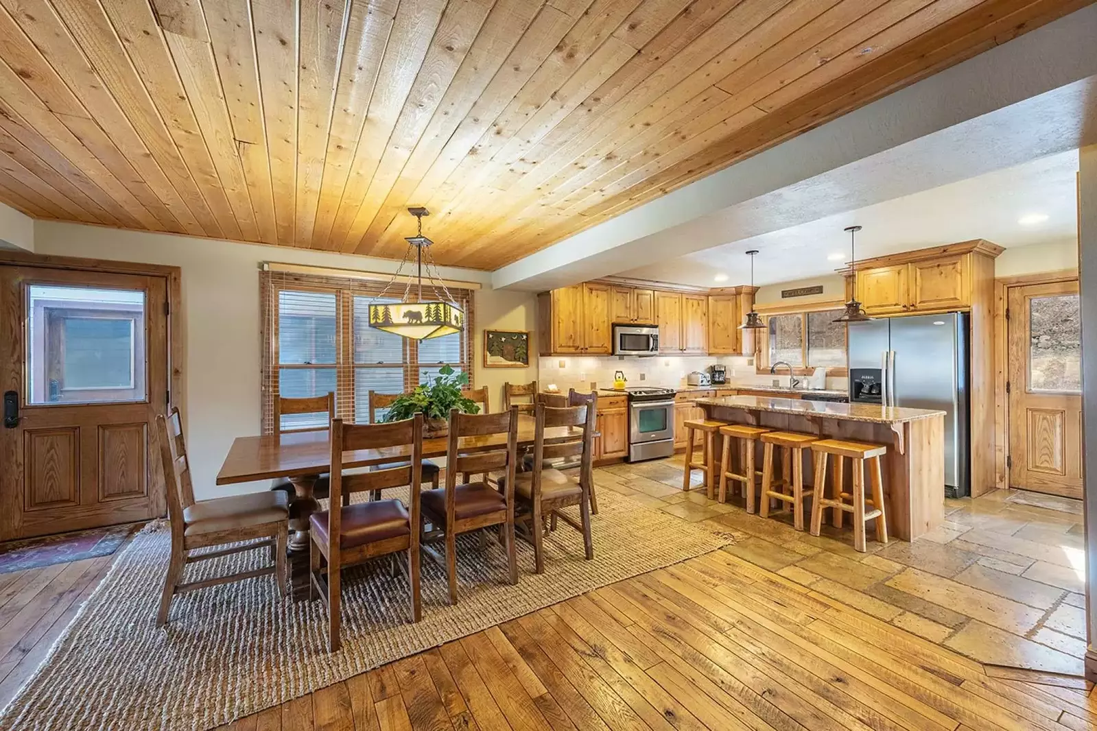 The gourmet kitchen is fully equipped with a complete range of household appliances including a fridge, oven & stove, dishwasher and microwave.