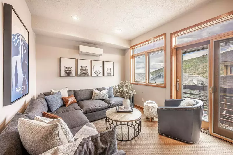 Experience ultimate comfort in our cozy and inviting second living room. Sink into the plush sectional sofa and enjoy your favorite shows on the high-