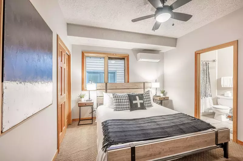 Experience the warmth and hospitality of our inviting guest suite, complete with a luxurious king bed and a plush en suite bathroom. Book now for an u