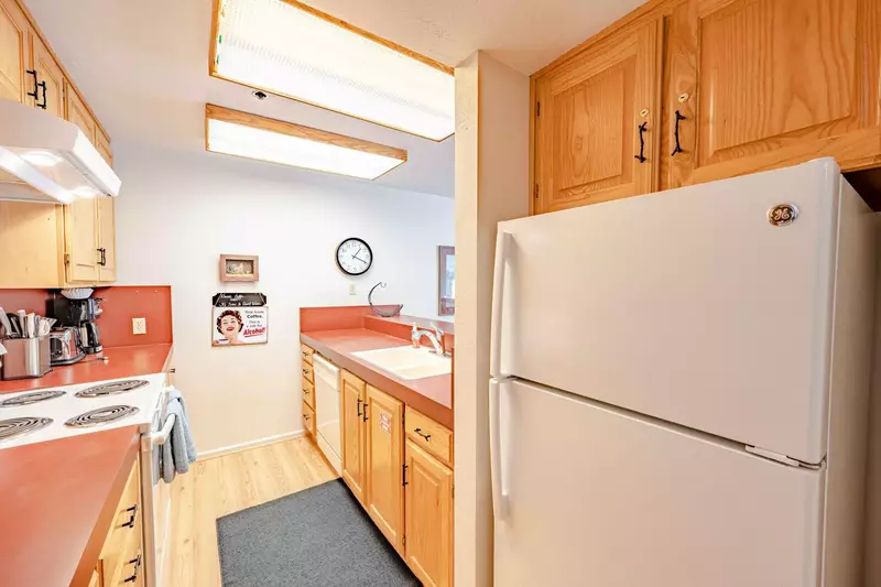 Our Fully StockedKitchen Features Hardwood Flooring, Full Size Major and Small Appliances