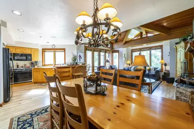 Gather together at this beautiful table for a warm meal after a day on the slopes. The table features enough to comfortably seat six (6) people.